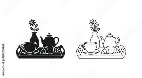 Breakfast tray with tea and croissant