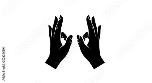 Photos Hands forming a mudra gesture are displayed as a black silhouette against a stark white background to symbolize mindfulness, meditation, and inner peace in a minimalist graphic design composition