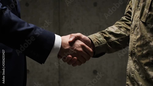 Business and Military Handshake Deal.