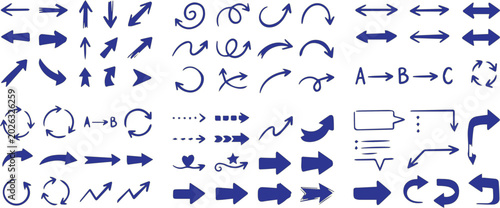 Fotografie Arrows and diagrams in blue ink showcase a wide variety of navigational symbols and informational markers