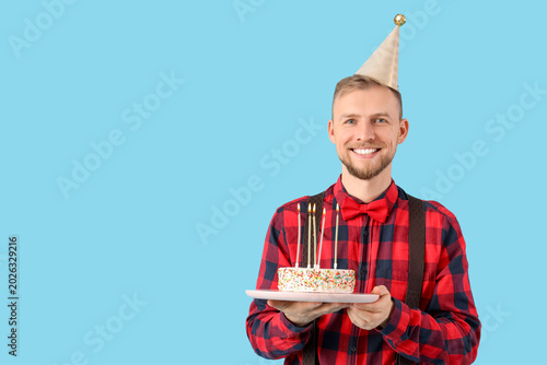 Happy young man in party ha...