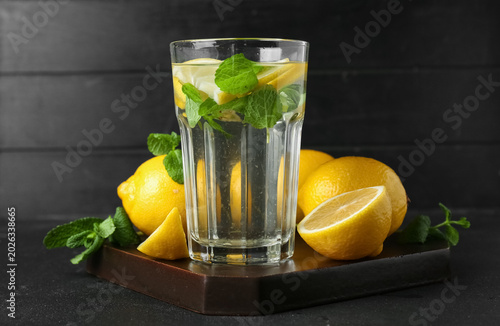 Board with glass of water, ...