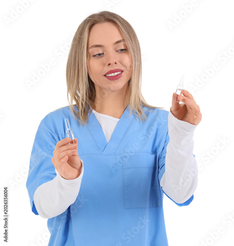 Female nurse with ampules o...