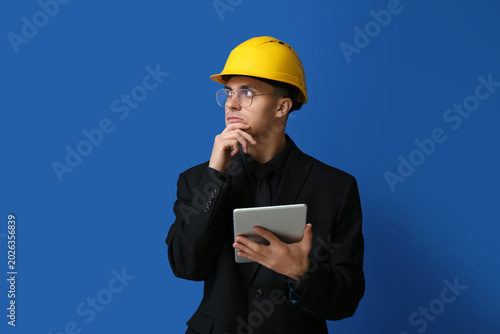 Thoughtful male engineer in...