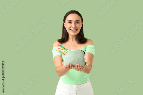 Beautiful young woman with ...