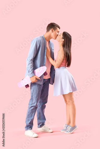 Happy young couple kissing ...
