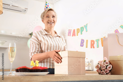 Mature woman with birthday ...
