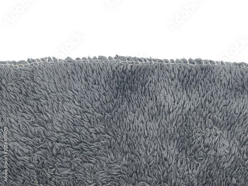 Fotografie A close-up image showing a textured, densely packed collection of elongated, greyish structures resembling fibers or microscopic formations against a black background