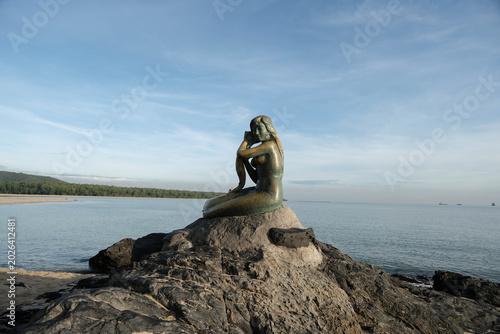 Close up of the legendary Golden Mermaid statue, Songkhla travel landmark