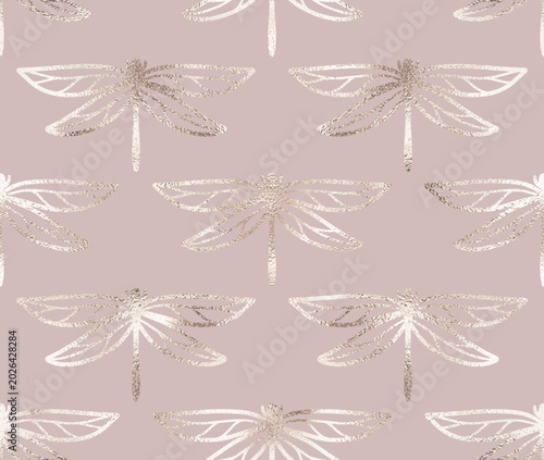 Decorative geometric seamless pattern with pale gold dragonfly ornament.