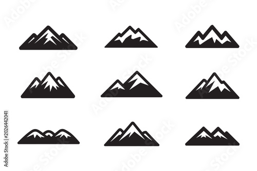 Fotografie A grid of various black mountain icons with different peaks and valleys on a whi