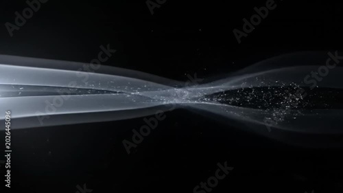 Abstract ethereal light waves flowing through dark space.