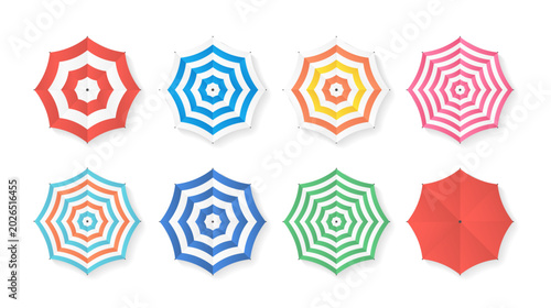 Foto Set of colorful beach umbrella with striped patterns and shadows, top view