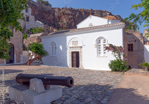 Elkomenos Christos church with an old cannon in Monemvasia, Greece