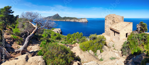 Bild auf Leinwand Panorama of  tower of Cala Basset (Torre de Cala en Basset) is a watchtower from