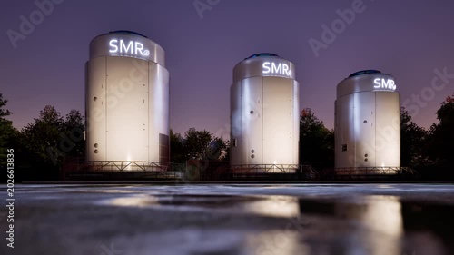 Smr or small modular nuclear reactors power plant against twilight sky