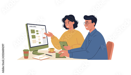 Two colleagues working on a computer and tablet with coffee cups business collaboration teamwork