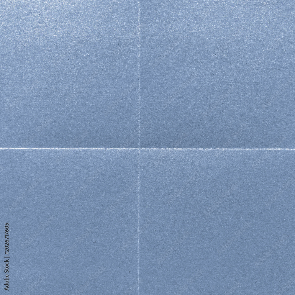Fototapeta premium Textured blue paper background with copy space