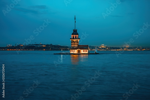 Maidenâ€™s Tower in Istanbul creates a warm evening view with gentle light over the Bosphorus and a peaceful waterfront atmosphere.