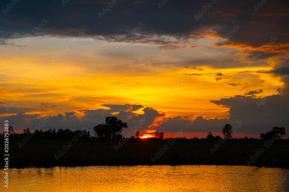 Fototapeta premium twilight Beauty Evening colorful clouds - sunlight with dramatic sky.Dramatic sky reflection in water.