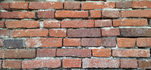 Bilde på lerret Walls made of red brick and cement