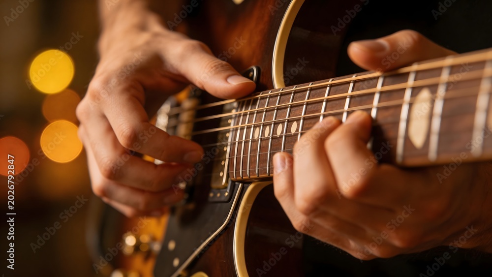 Obraz premium Hands playing electric guitar