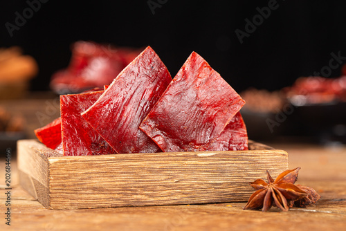 Delicious pork jerky is placed on the wooden，pork jerky, 
