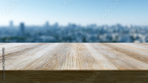 Wooden surface with blurred city skyline background