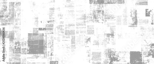 Faded newspaper pages with text and in grayscale tones. A collage of printed vintage