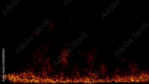 Realistic ground fire burning with intense flames and sparks on a black background.