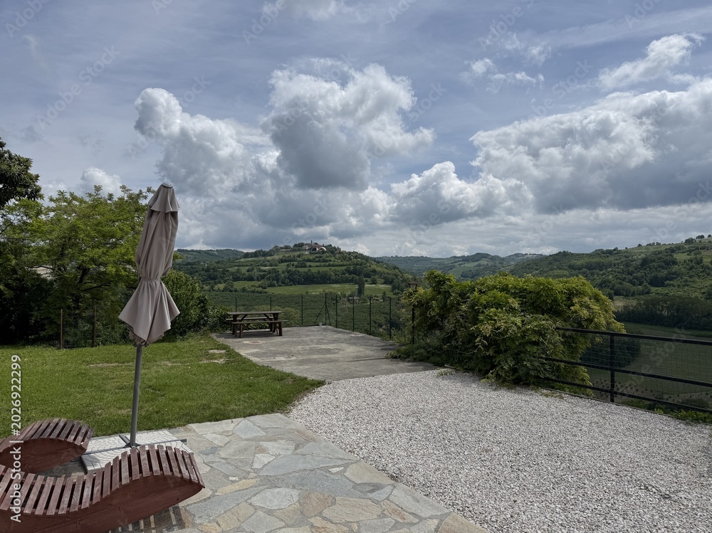 Fototapeta premium Scenic Terrace Overlooking Rolling Hills and Vineyards in Piedmont Italy