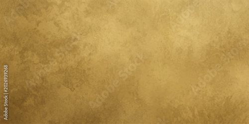 Foto A textured, close-up view of a brushed brass metal surface, showcasing its warm, metallic sheen and subtle linear patterns, perfect for backgrounds and design elements
