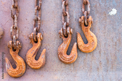 Old rusted metal hook and chain