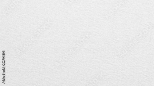 White textured paper background with subtle grain