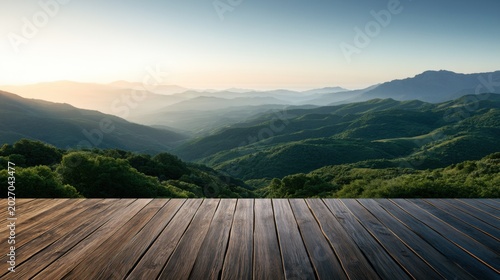 Wooden deck overlooking mountain range landscape