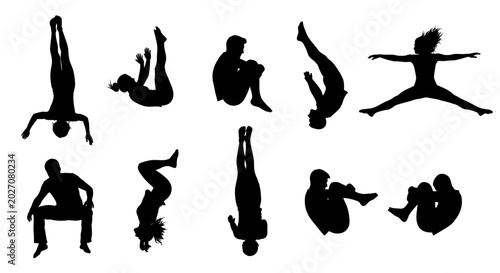 Fotografie Silhouettes of people doing gymnastics poses.