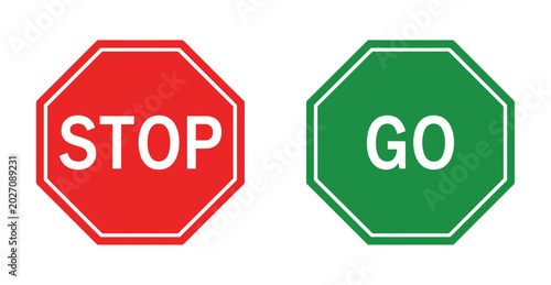 Tableau sur toile Stop and Go Signs: Red octagon stop sign and green octagon go sign