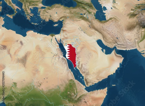 Satellite view of the Middle East region with the national flag of Qatar overlaid prominently