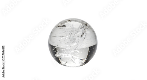 Clear quartz stone on black background with white background and small hole.
