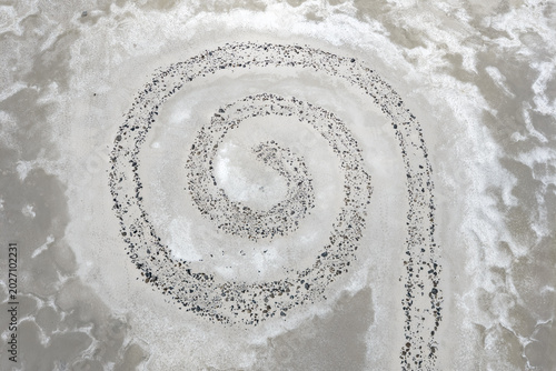 Foto Topdown of formed rocks on the beach