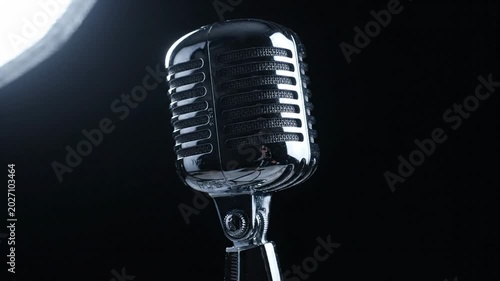 Classic vintage microphone dark backdrop