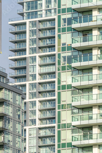 Modern apartment building with balconies and urban architecture