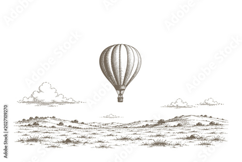 Canvastavla Vintage line art vector illustration of a solitary hot air balloon flying high o