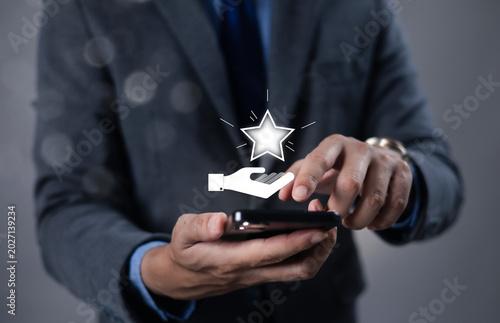 The glowing star symbol above the hand indicates loyalty rewards, bonus points, and successful redemptions. Points, Loyalty, Rewards, Vouchers, Coupons, Cashback.