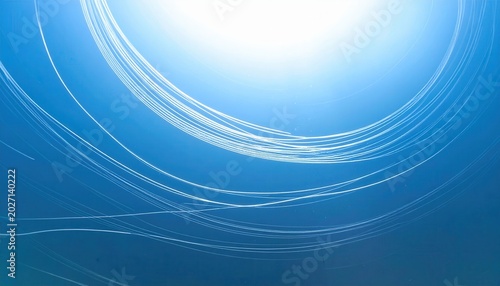 Fond bleu abstrait avec lumière éthérée et lignes blanches lumineuses de flux de données