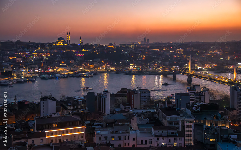 Fototapeta premium Sunset panorama view seen form Galata Tower with Hagia Sophia Blue Mosque Topkapi and another famous landmark in European or Asian parts of Istanbul Turkey 