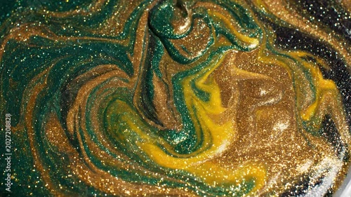 Mesmerizing Swirls of Emerald Green and Gold Glitter Paint.