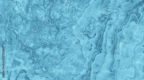 Photos Abstract textured background in shades of turquoise and teal, resembling marble or agate patterns