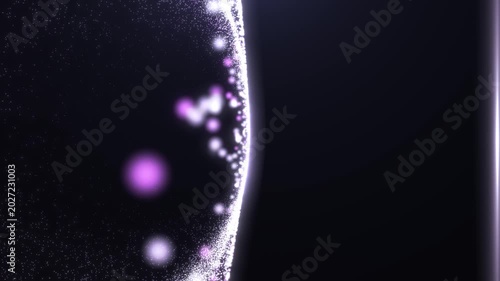 Glowing cosmic particles orbiting a bright circular edge in deep space with futuristic abstract light motion animation.