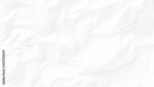 Crumpled white paper texture background with creases and folds abstract design element